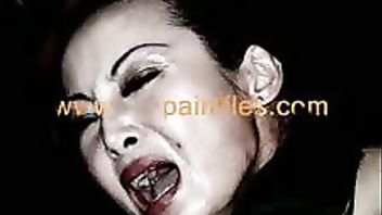 A busty hottie in pantyhose gets her tits groped and clamped